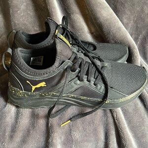 Puma Women’s Black Sneakers with Yellow Accents